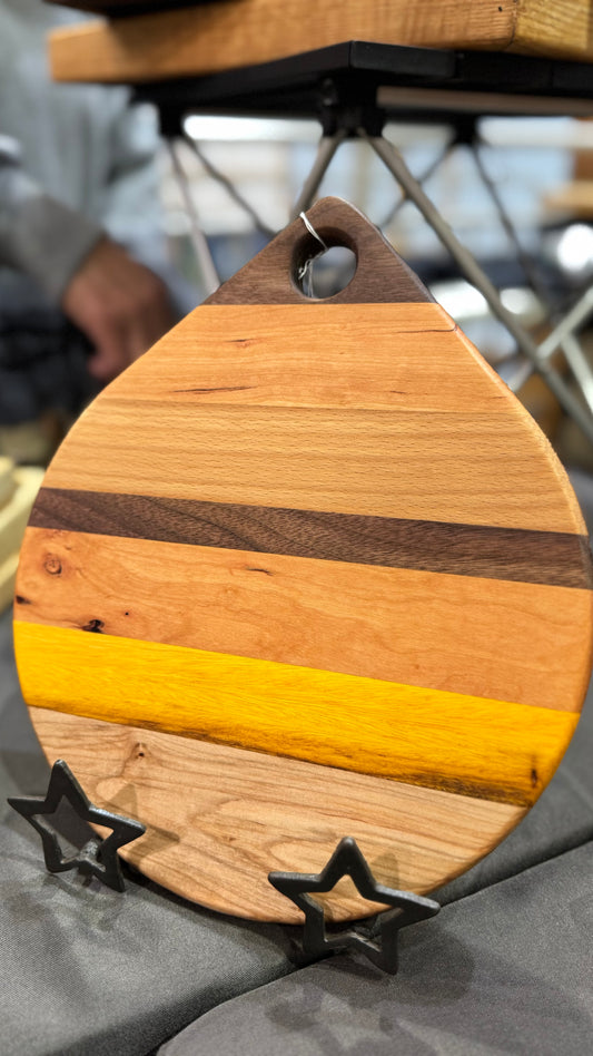 Teardrop shaped cutting board