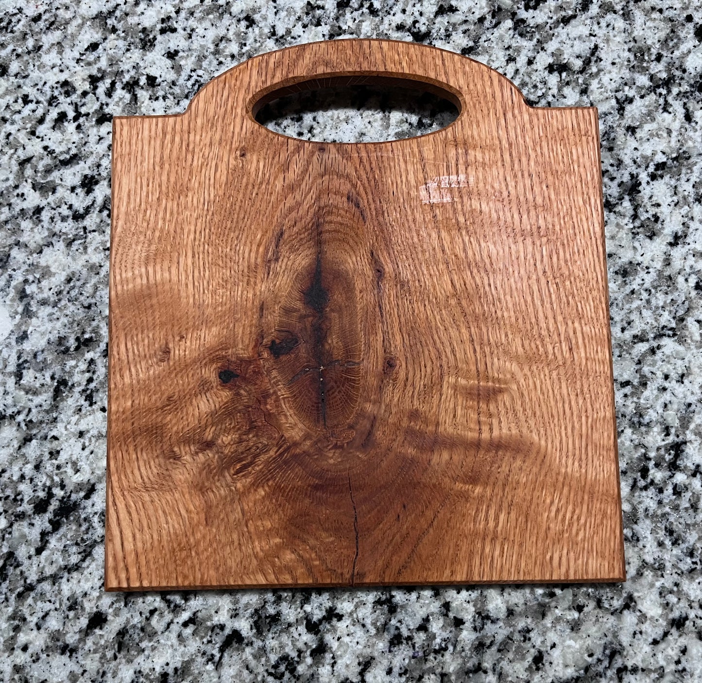 Oak cutting board w/ oval handle